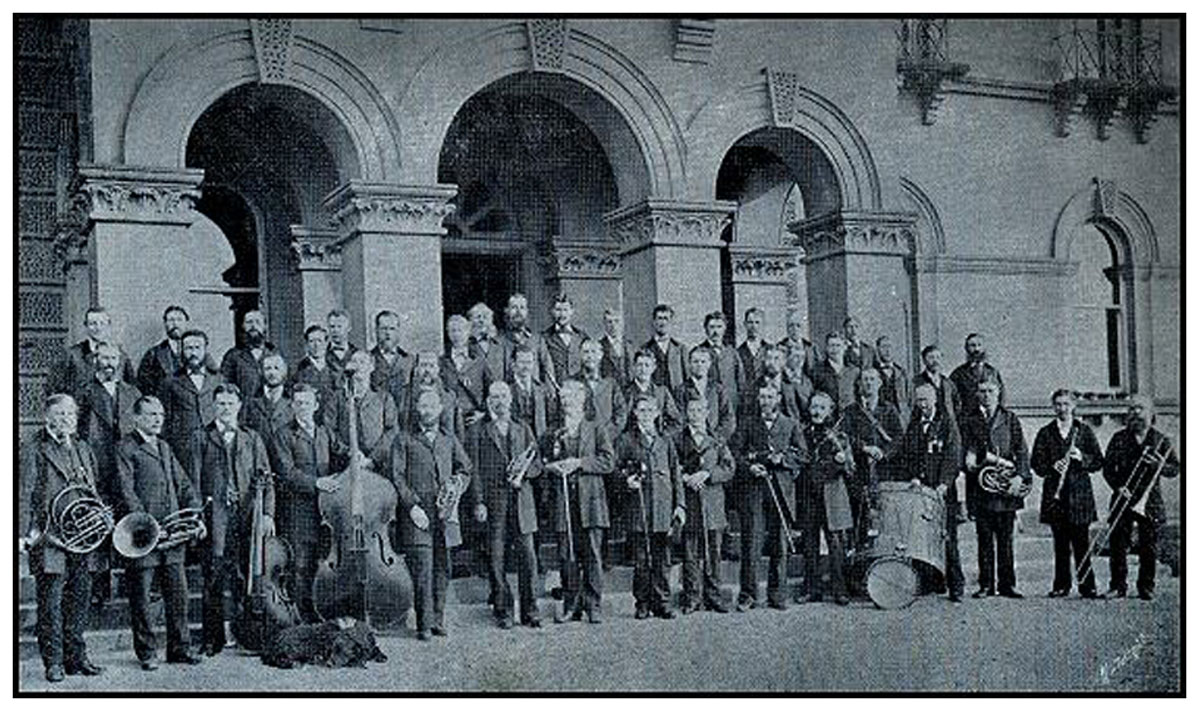 Possible photograph of Richard Davis at the South Yorkshire Asylum, with the big drum. He appears to be wearing three medals. Click to enlarge.